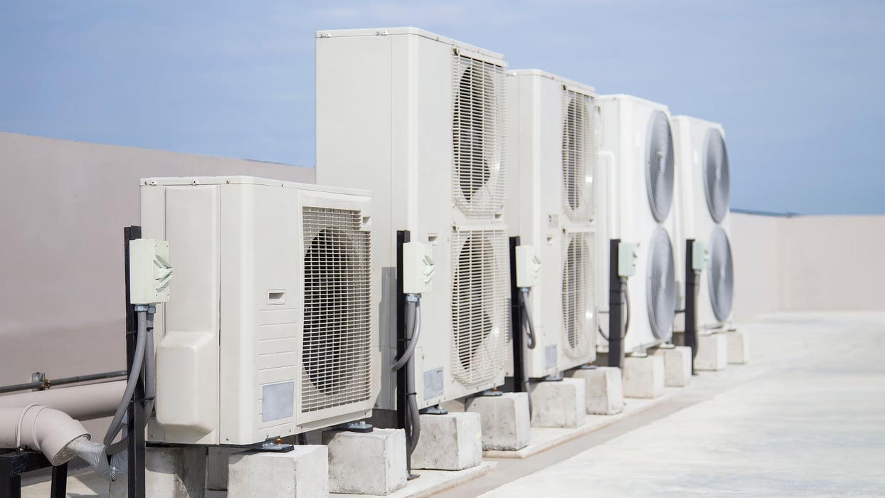 Air conditioning (HVAC) installed on the roof of industrial buildings.