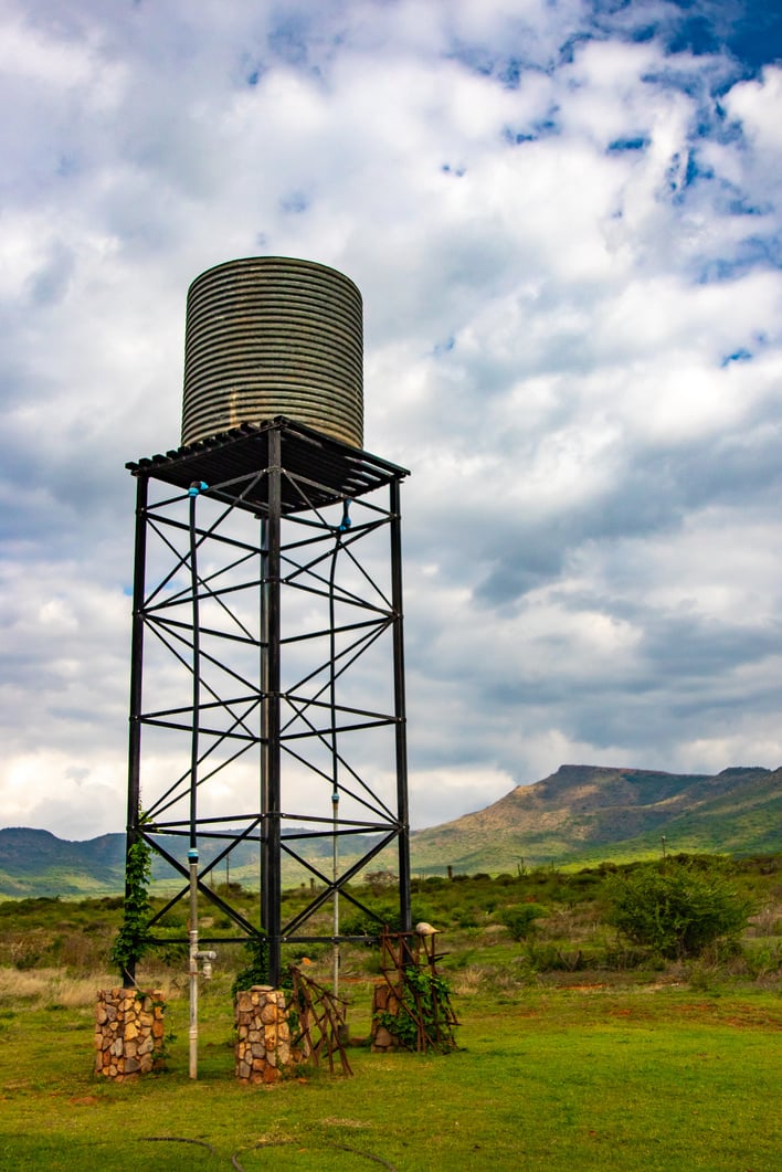  A Water Tank under a Cloudy Sky